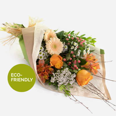 Peaches and Cream - A beautiful collection of flowers simply wrapped and ready to arrange.