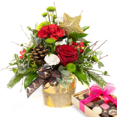 Starlight (With Chocolates) - Show your love this Christmas with this wonderful collection of wintry flowers arranged in a co-ordinating pot.